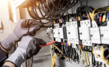 electrician-engineer-tests-electrical-installations-wires-relay-protection-system-adjustment-scheme-automation-control-electrical-equipment_545582-403